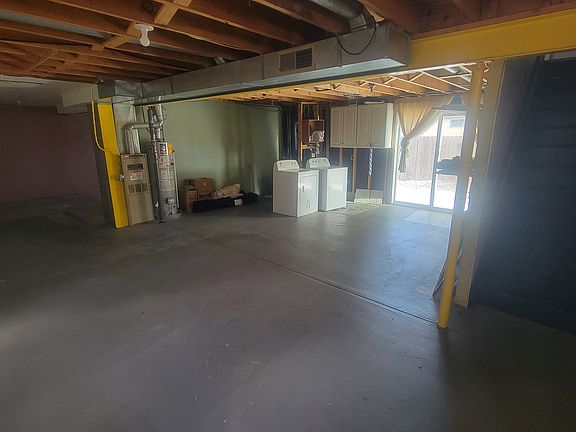 5th image of 4490 S Newton St