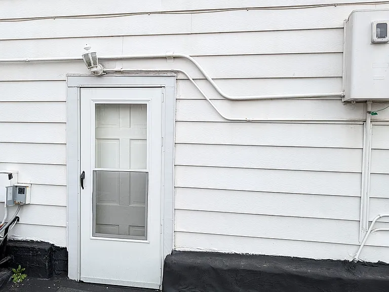 One of two back entrances that lead to off street parking