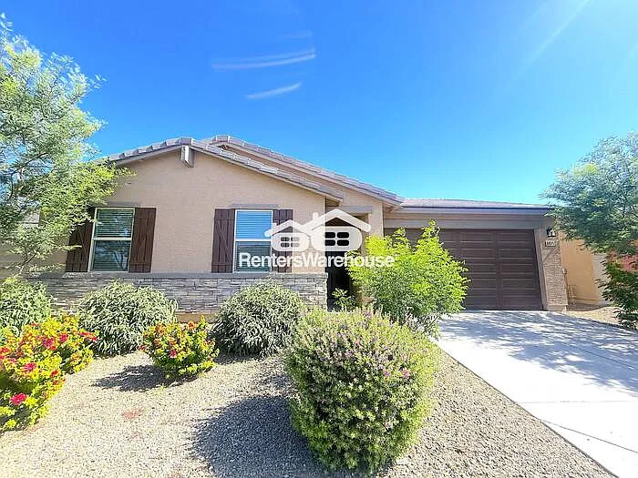 8825 W Albeniz Pl — Photo 1