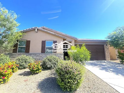 8825 W Albeniz Pl Photo 1