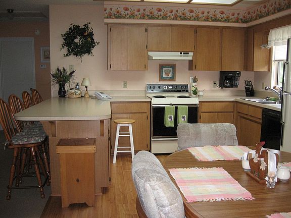 Kitchen has granite and new stainless appliances