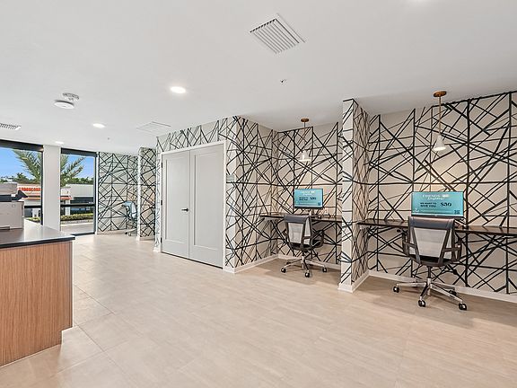 Coworking Lounge with Computers and Printers