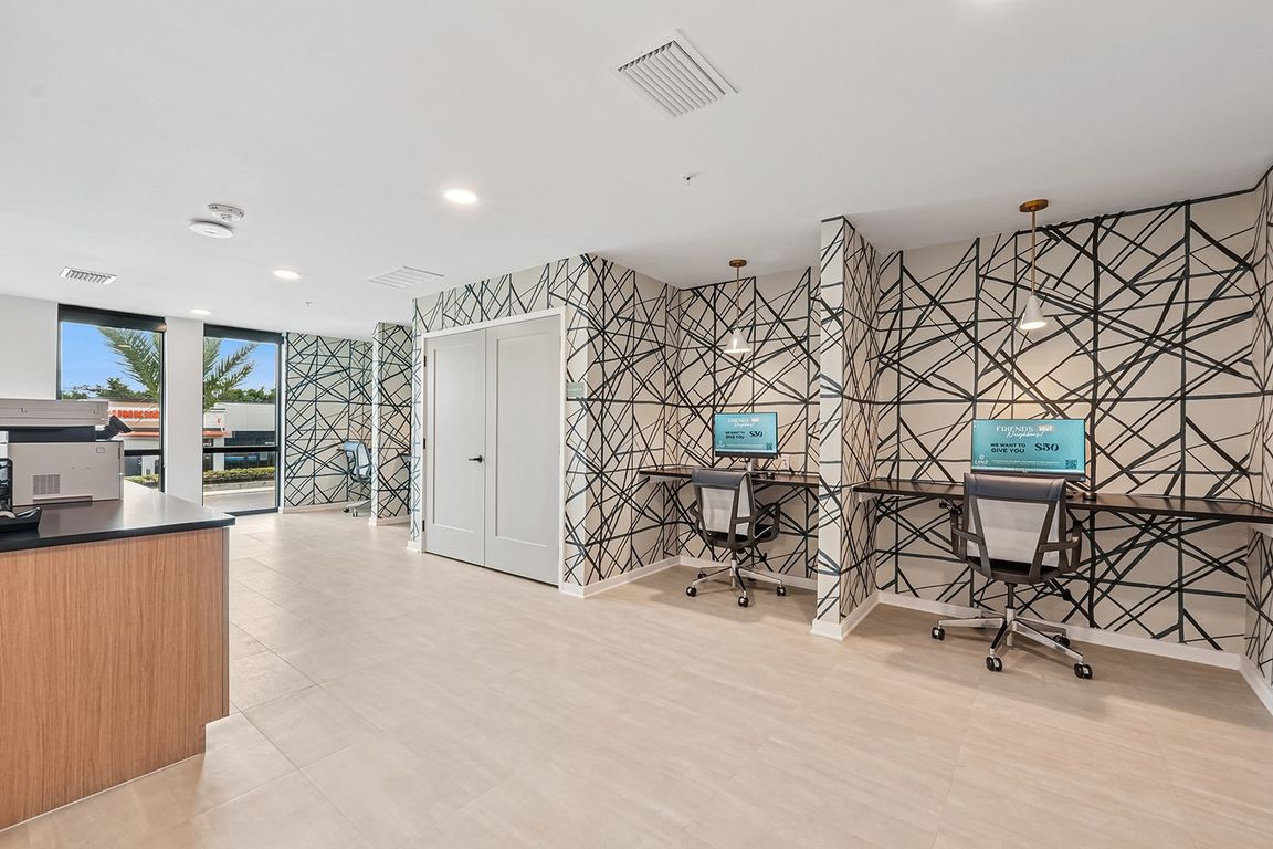 Coworking Lounge with Computers and Printers