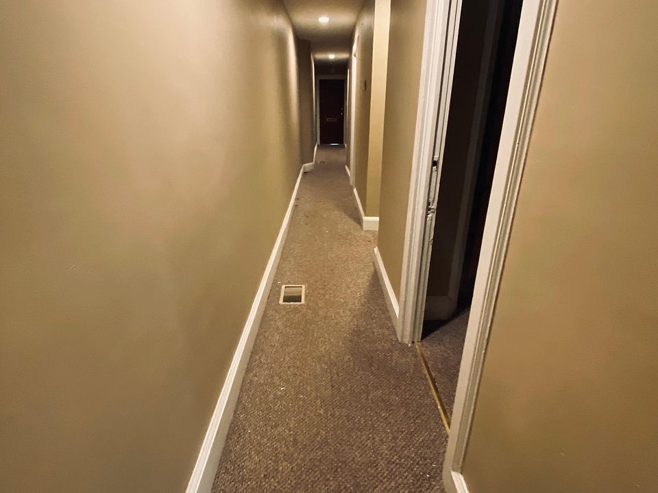 Looking Down Main Hall from Dining Room toward front door.