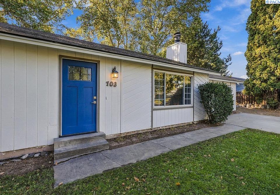 1st image of 703 W 48th Ave