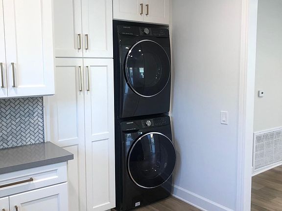 Kitchen: Front loading Washer & Dryer, Large Pantry with pull out Drawers