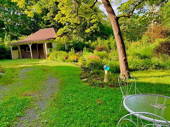 Driveway and 2 car garage.