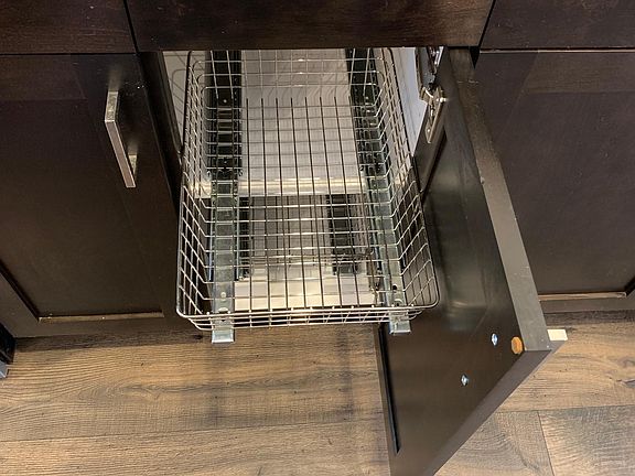 Owner has upgraded kitchen cabinets with roll-outs