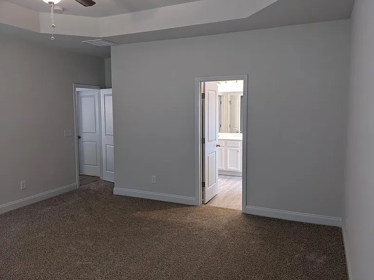 Master bedroom with ensuite bathroom