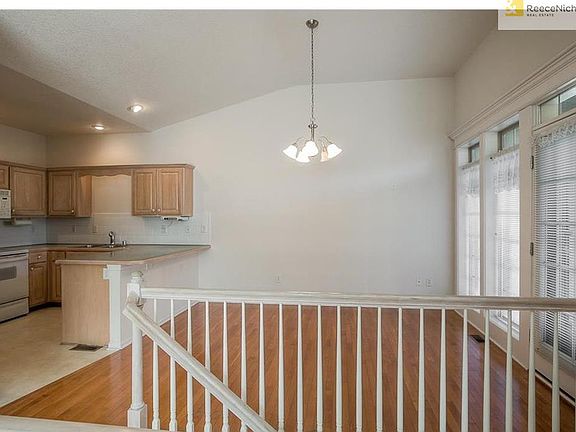Looking from the living room into the dining area and kitchen.