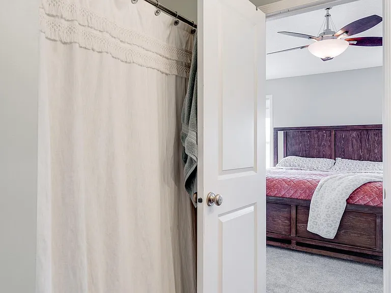 upper floor - bathroom looking into master