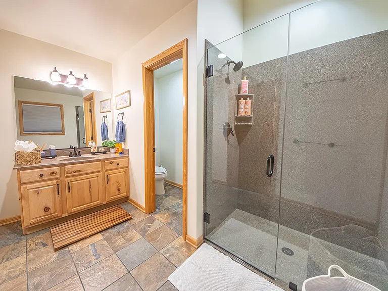 Pool room bath with shower.