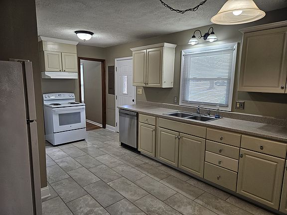 updated kitchen flooring and newer appliances