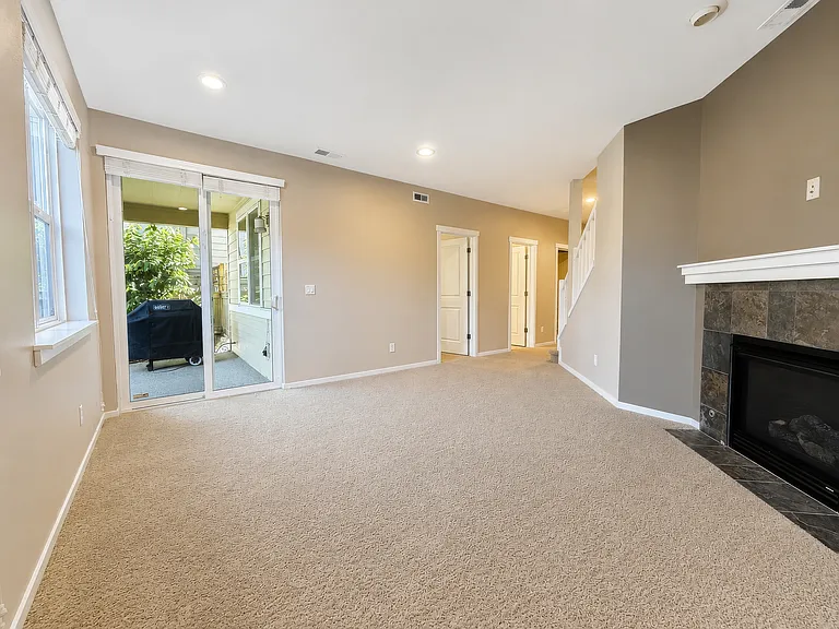 Daylight basement with living area and rec room. Basement also has a bedroom and a bathroom with a shower, making it perfect for guests!