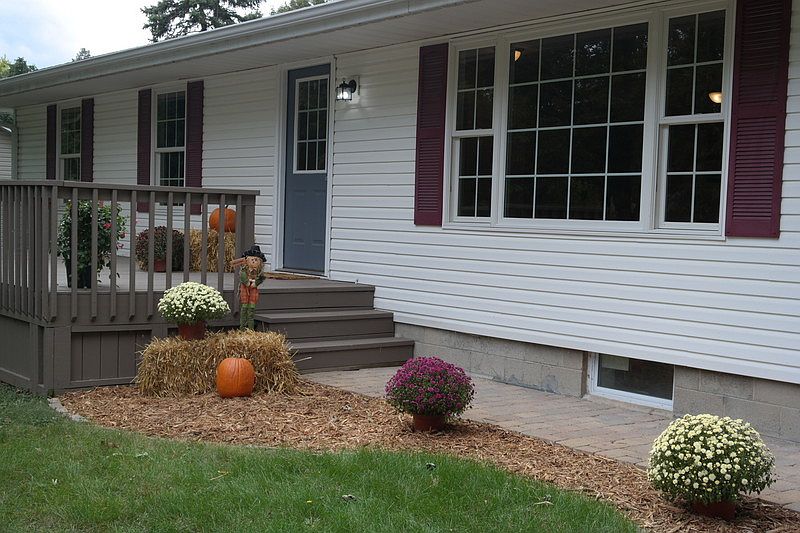 Front Entry
						:
						Paver walkway to front door. New siding, gutters, windows & doors in 2007.