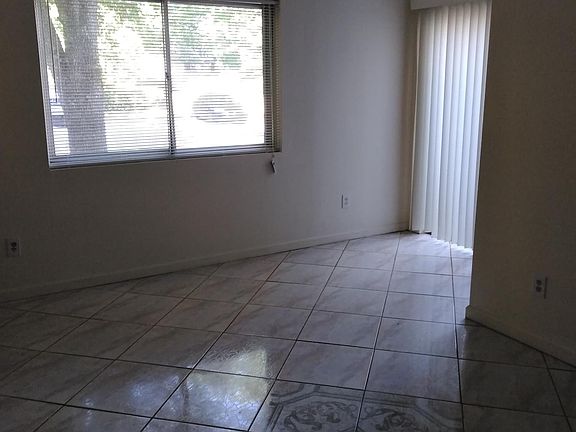 Living room with the glass door to padio