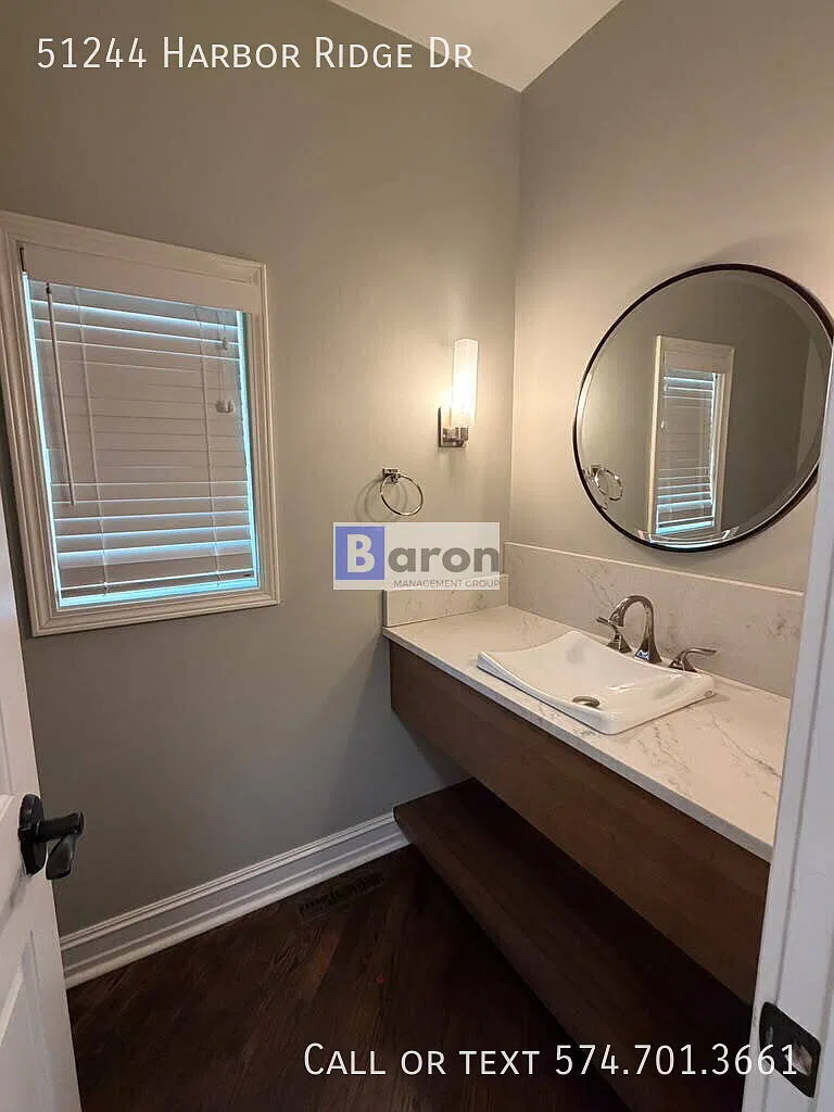 "Luxury Living Awaits: Spacious 4-Bedroom Home. Gleaming Hardwood Floors in Granger, IN!" — Photo 4