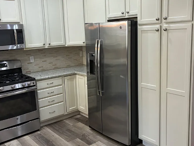 9077 E Phillips Ln — Photo 8