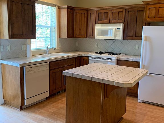 Kitchen with back door access to patio
