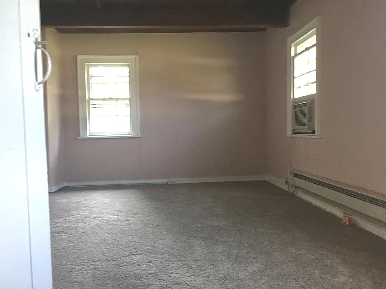 Bedroom with new paint and carpet