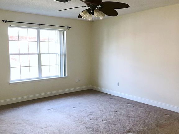 Downstairs master bedroom with large window