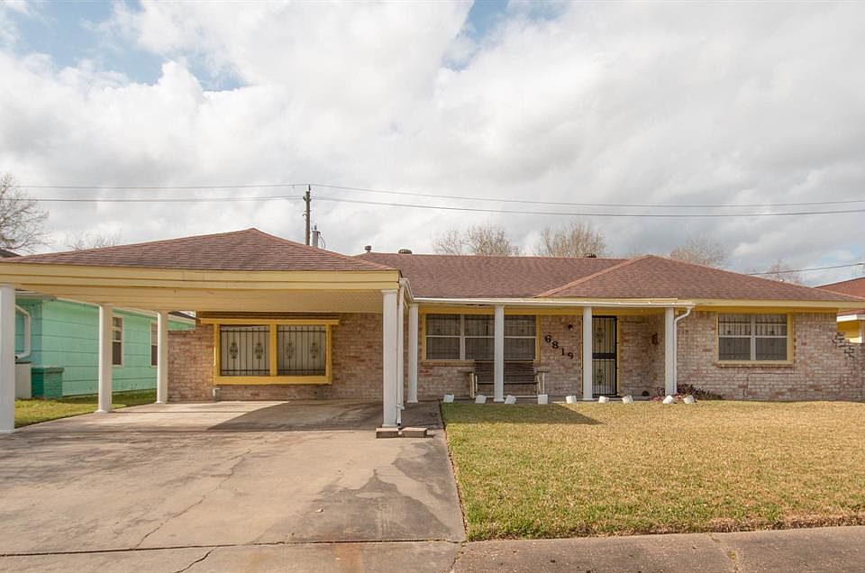 Front view with carport