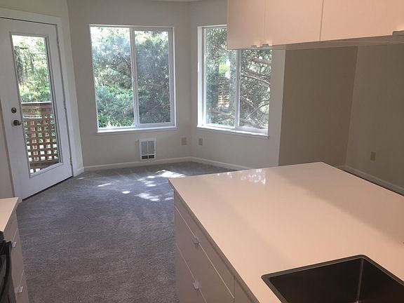 Open plan kitchen-living.  Available unit will NOT have carp