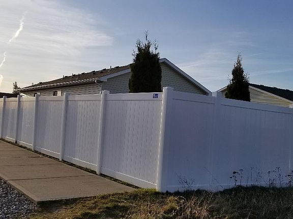 Fenced back and side yard.