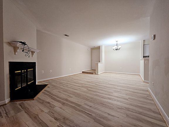 Living/dining room with new flooring.