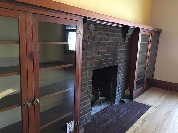 fire place and built in cabinets in living room