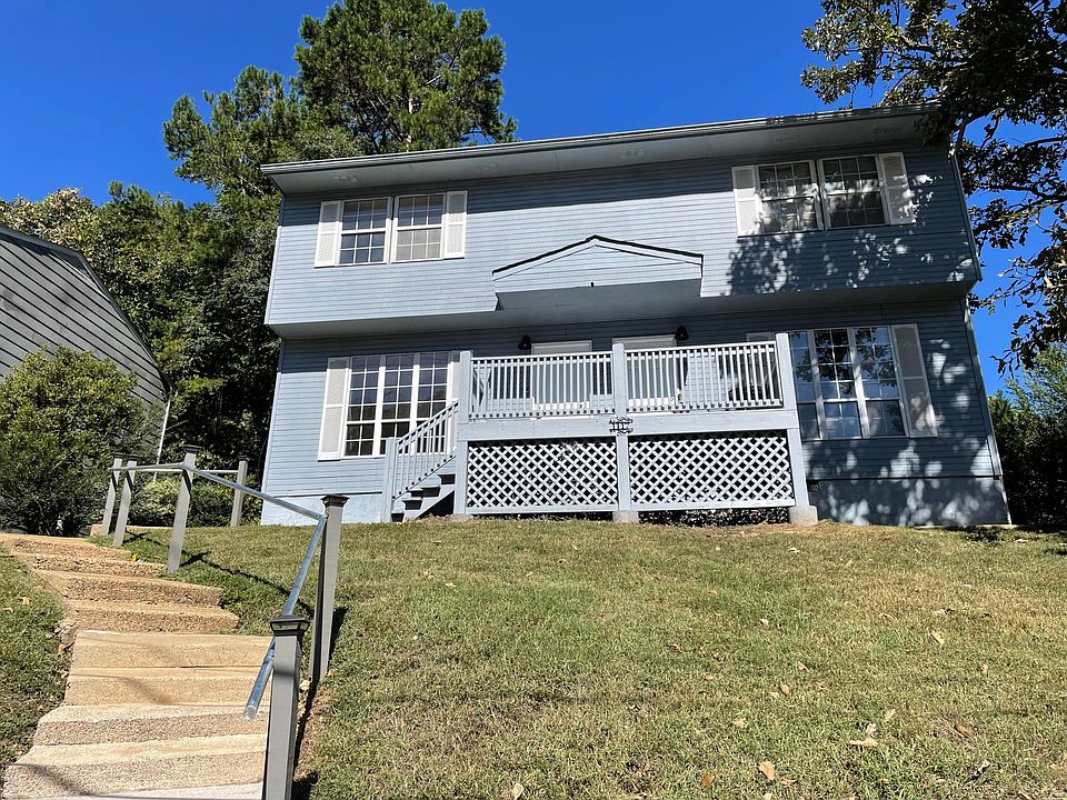 located on a large corner lot and elevated for a great view down the road to the mountains