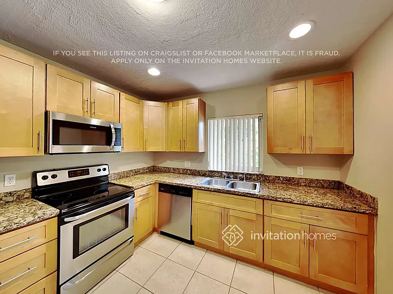 6864 NW 28th Ave — Photo 8