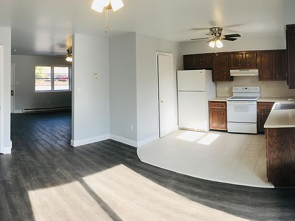 Panaroma of dining room and kitchen - looking through to the living room