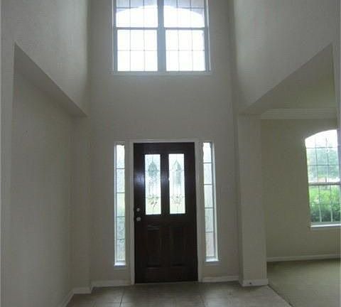 View of entrance with 2 story foyer