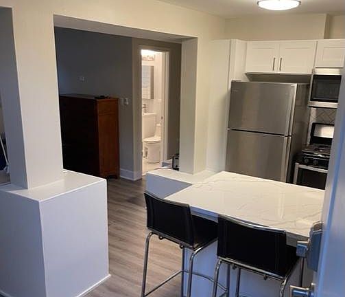 View of kitchen from front door