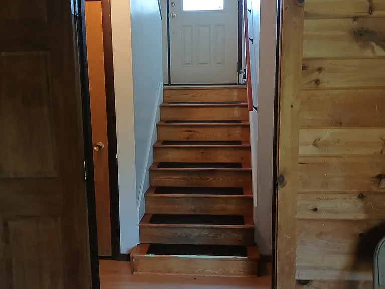 stair from 1st floor to front door