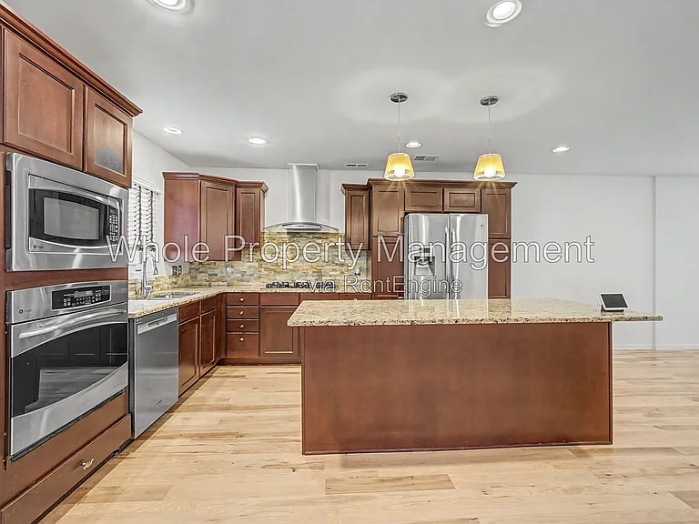 3211 S Cherokee St — Photo 8