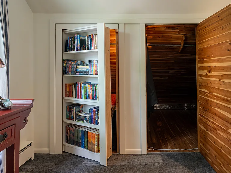 Third floor bonus room features a "secret" reading nook and oversized cedar storage area.