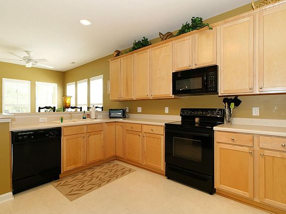 Lots of cabinet and counter space and a pantry to boot.