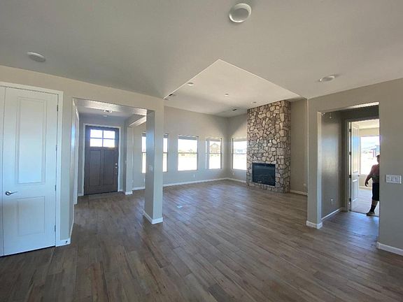 Great Room - Stone Fireplace Electric Start with Gas, Wood Plank Tile Flooring, 12 ft. Ceiling, Mountain Views