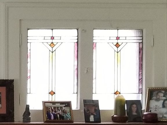 Prairie-style windows above mantle