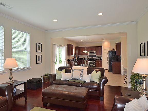 Living room opens to kitchen