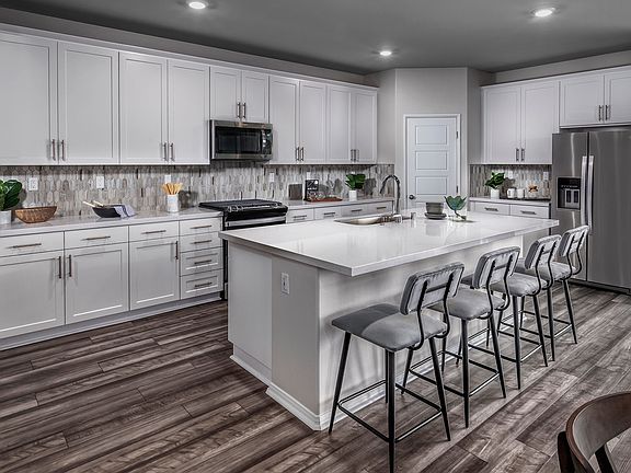 Residence 1 kitchen modeled at a nearby Meritage community.
