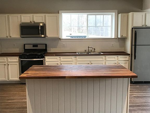 Kitchen, w/butcher block island. 
