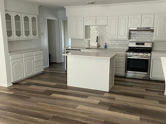 LOOKING INTO KITCHEN FROM THE DEN.
