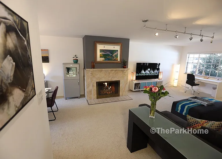 Looking into the living and dining areas from the hallway.