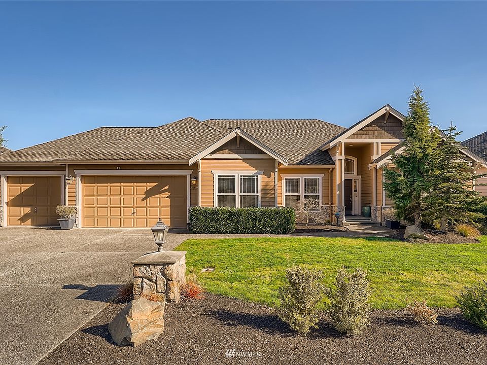 Welcome to 3819 52nd St NE   Browns Point Home with a view of Mount Rainier