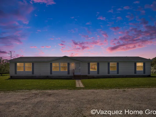 83 Canada Rd, Casnovia, MI 49318