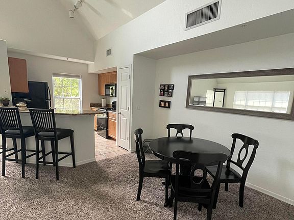Kitchen and space for a table for dining