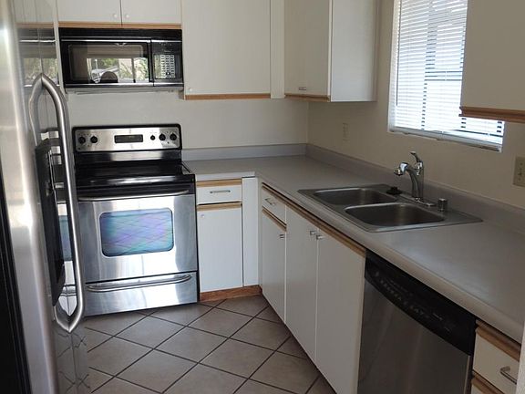 Kitchen with Microwave, Dishwasher and Disposal